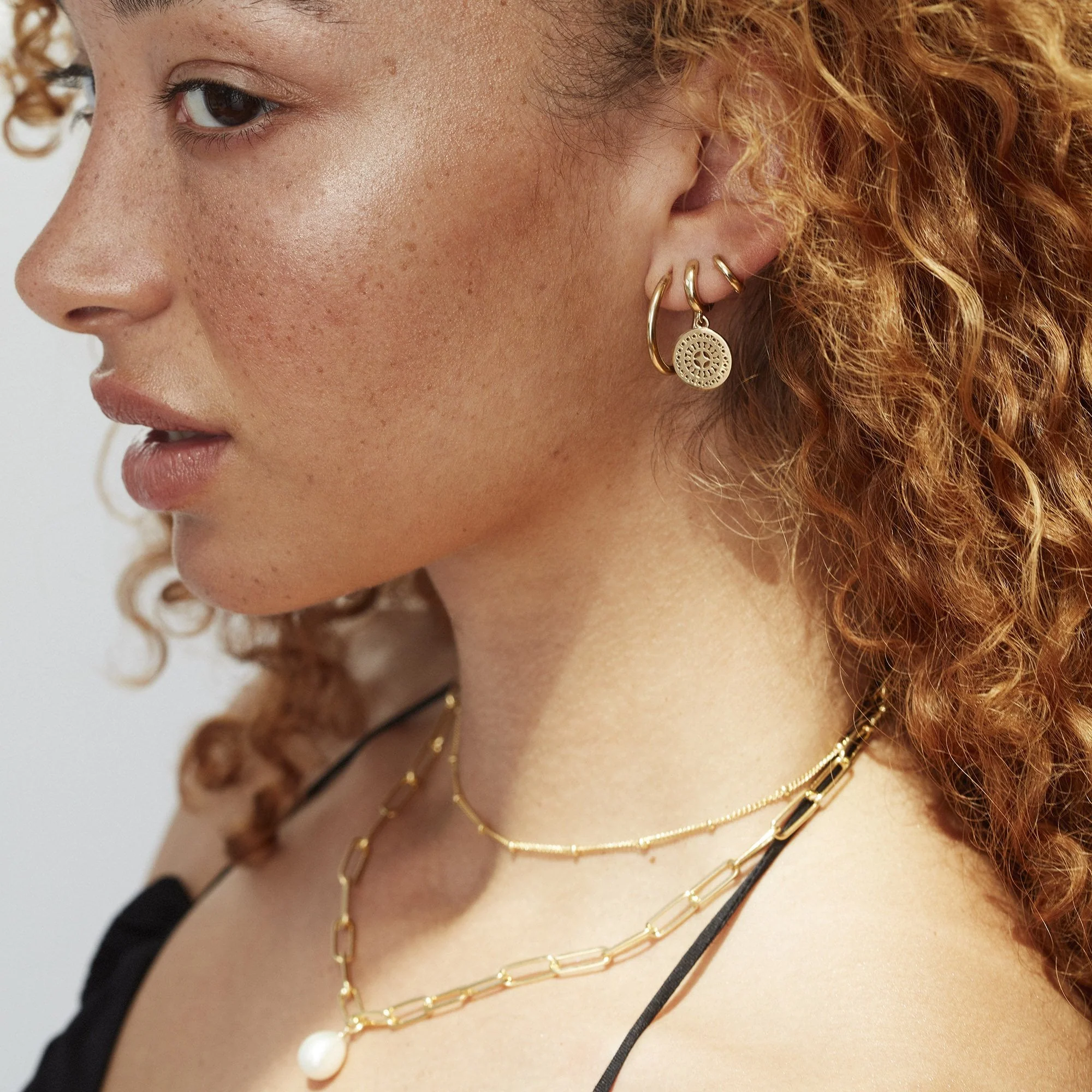 Ancient Sun Huggie Hoop Earrings Silver - Image 2